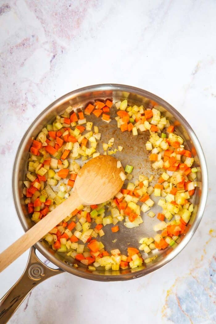 sauteed carrots, celery, and onion in a skillet