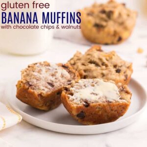 two gluten free banana muffins on a plate, one cut in half and buttered