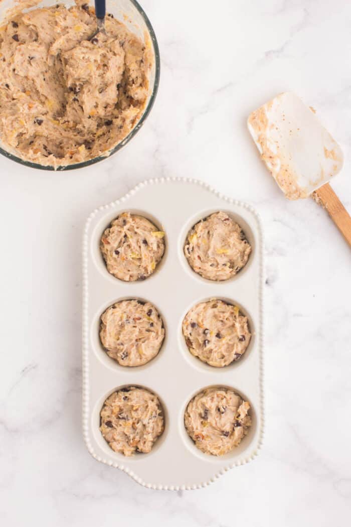 muffin tin filed with batter