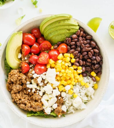 overhead from a beef burrito bowl with lots of toppings