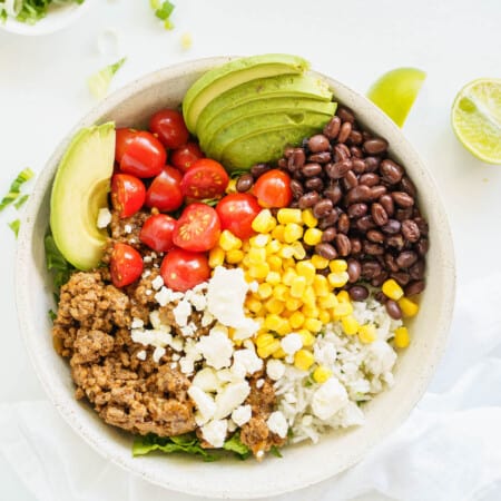 overhead from a beef burrito bowl with lots of toppings