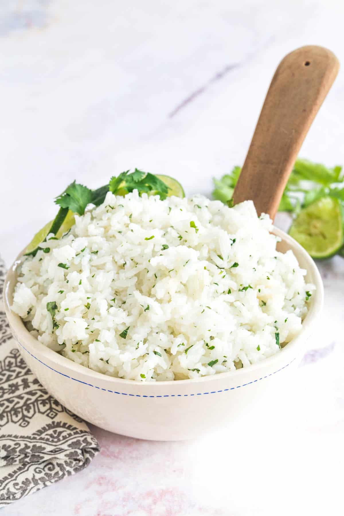 bowl of white rice flecked with minced cilantro