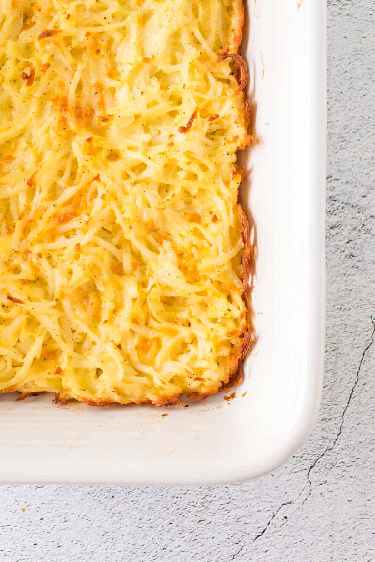 corner of the casserole in a white baking pan