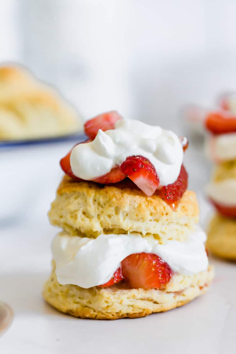 A Single Strawberry Shortcake Sitting on Top of a White Surface