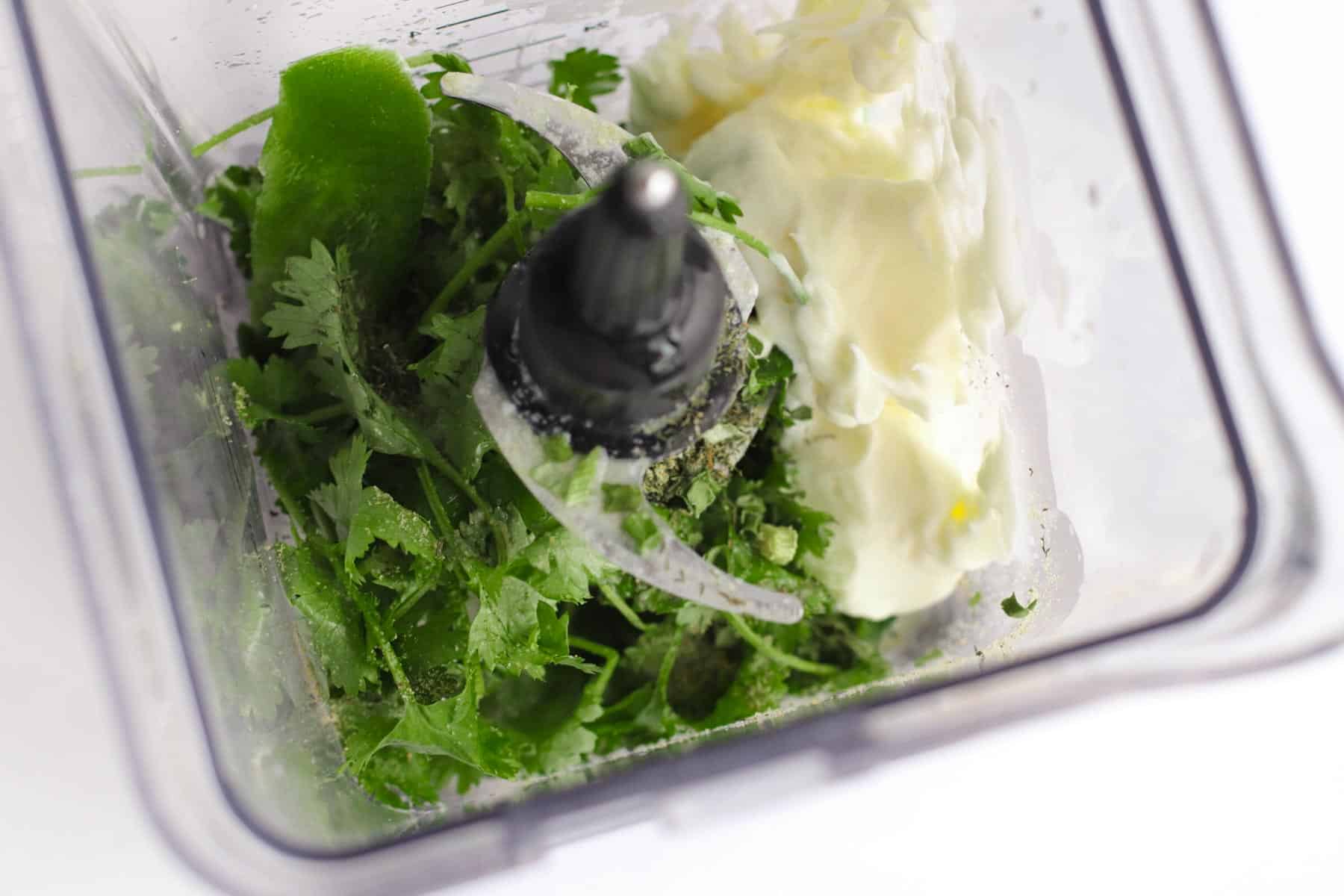 cilantro, mayonnaise, and other dressing ingredients in a blender