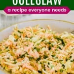 bowl of coleslaw garnished with parsley