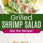 A large serving bowl of salad with corn, avocado, hard boiled eggs, cheese, and grilled shrimp with a light green creamy dressing and a the dressing being poured over the bowl divided by a green box with text overlay that says "Grilled Shrimp Salad" and the words "Get the Recipe!".