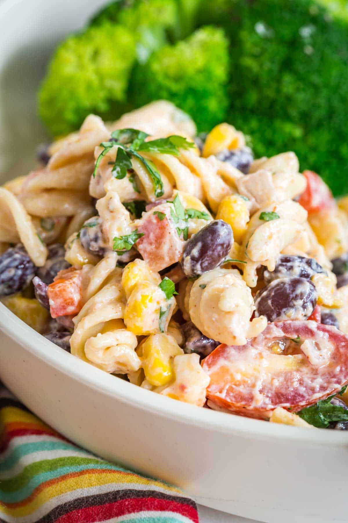 mexican pasta salad served on a white plate