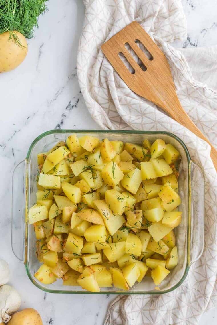 glass baking dish with dill hash browns