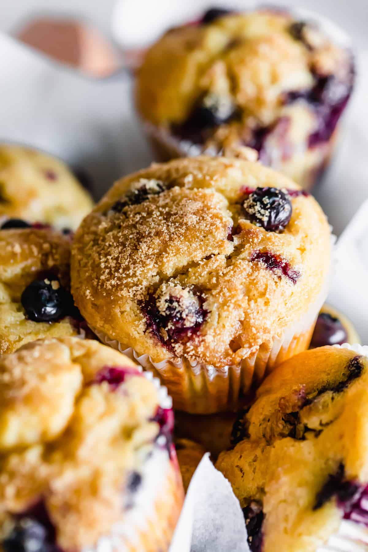A Super Tight Shot of a Gluten-Free Blueberry Muffin with a Light Brown Sugar Topping