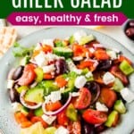 Greek salad in a speckled serving bowl