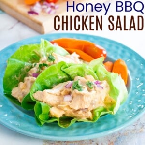 barbecue chicken salad lettuce wraps on a blue plate