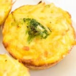 closeup of a broccoli potato cheese egg muffin