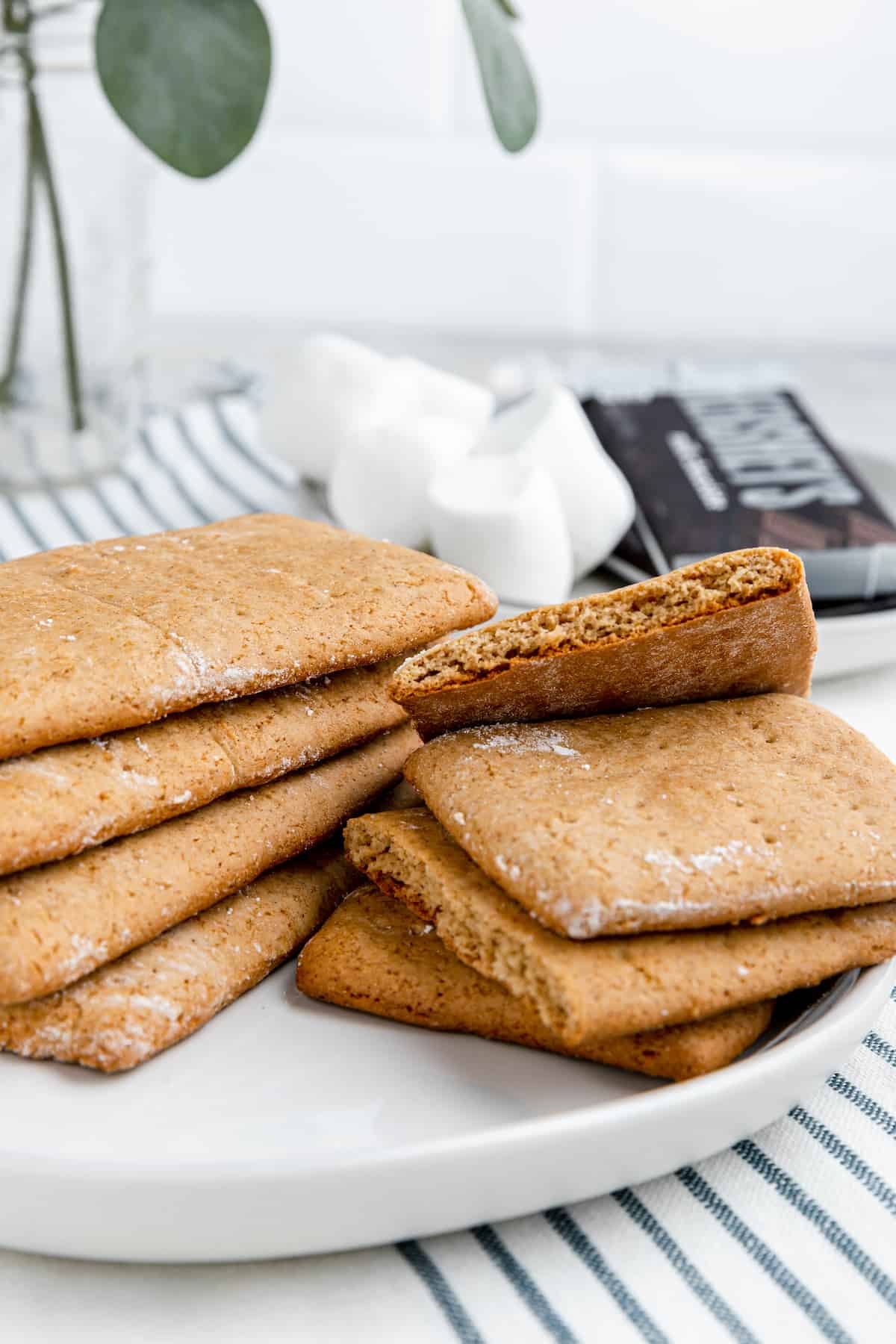 stacks of gluten-free homemade graham crackers on a white plate