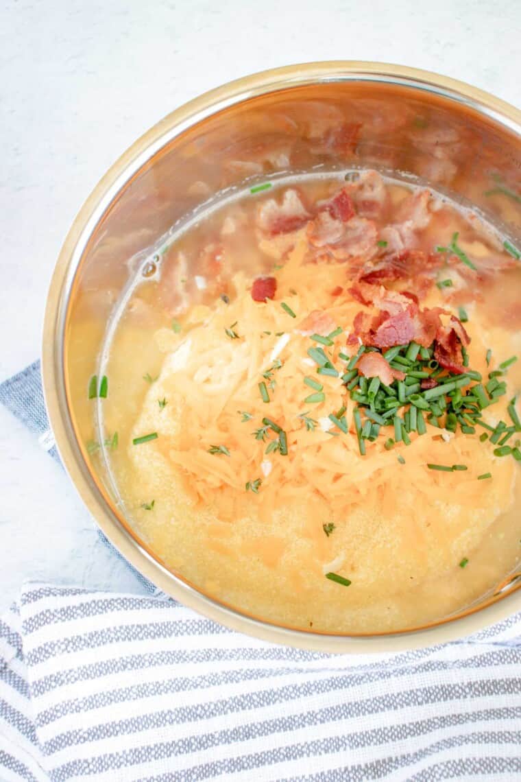 boiling water, polenta, cheese, bacon, thyme, and chives in a small saucepan
