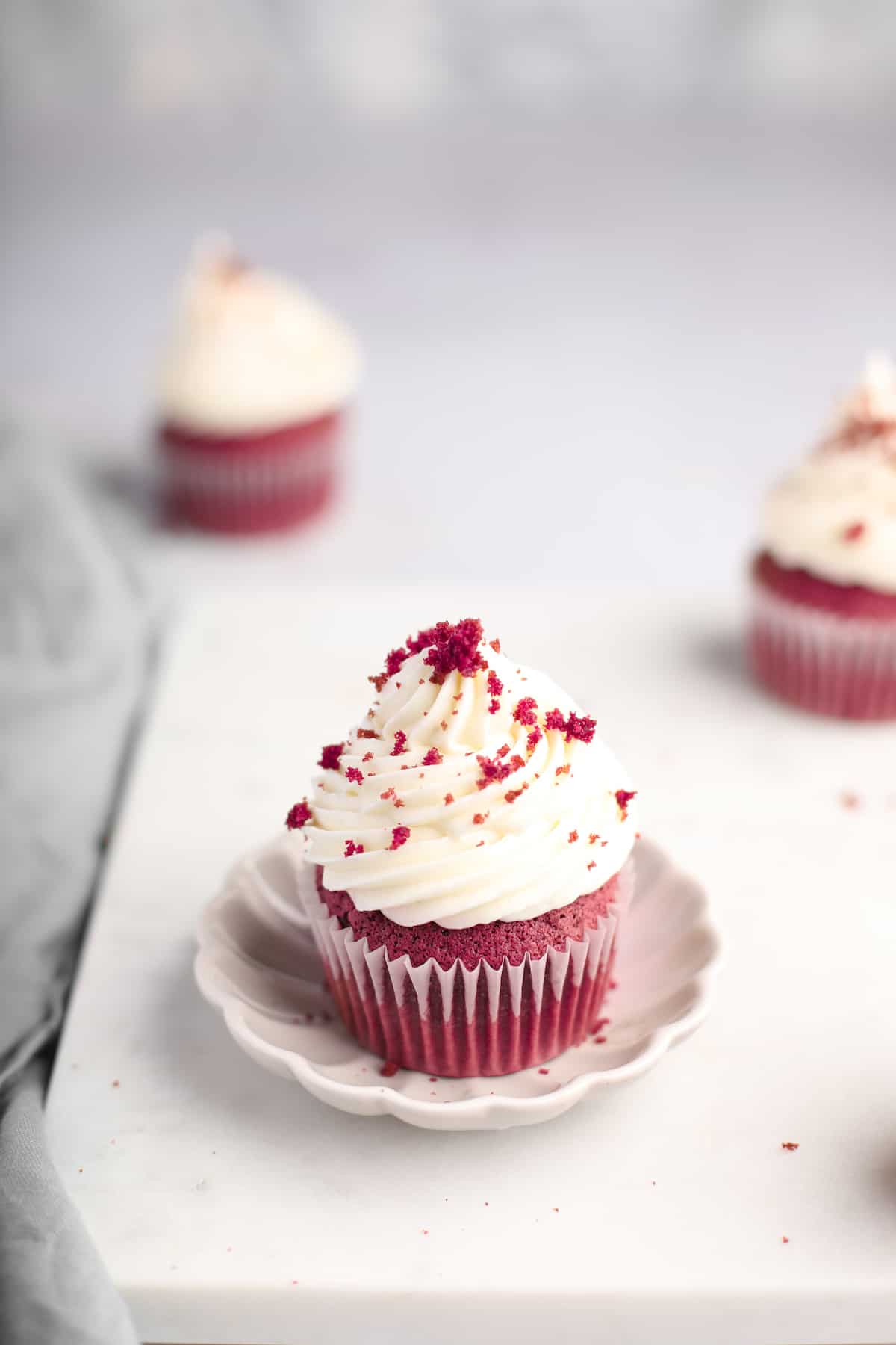 whole gluten free red velvet cupccake with the wrapper removed