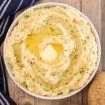 bowl of mashed potatoes with butter and chives