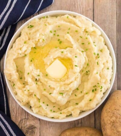 bowl of mashed potatoes with butter and chives