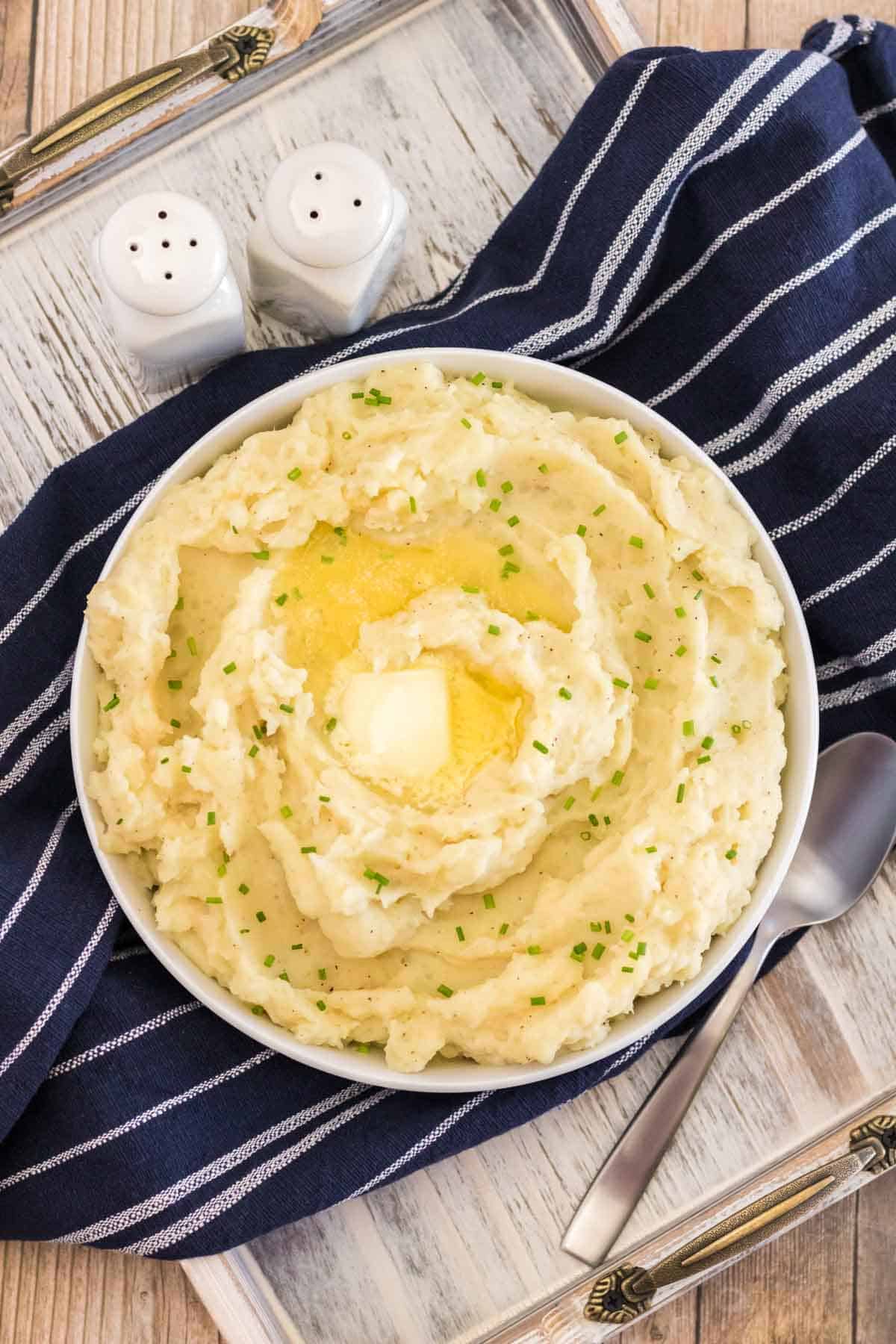 bowl of mashed potatoes with butter