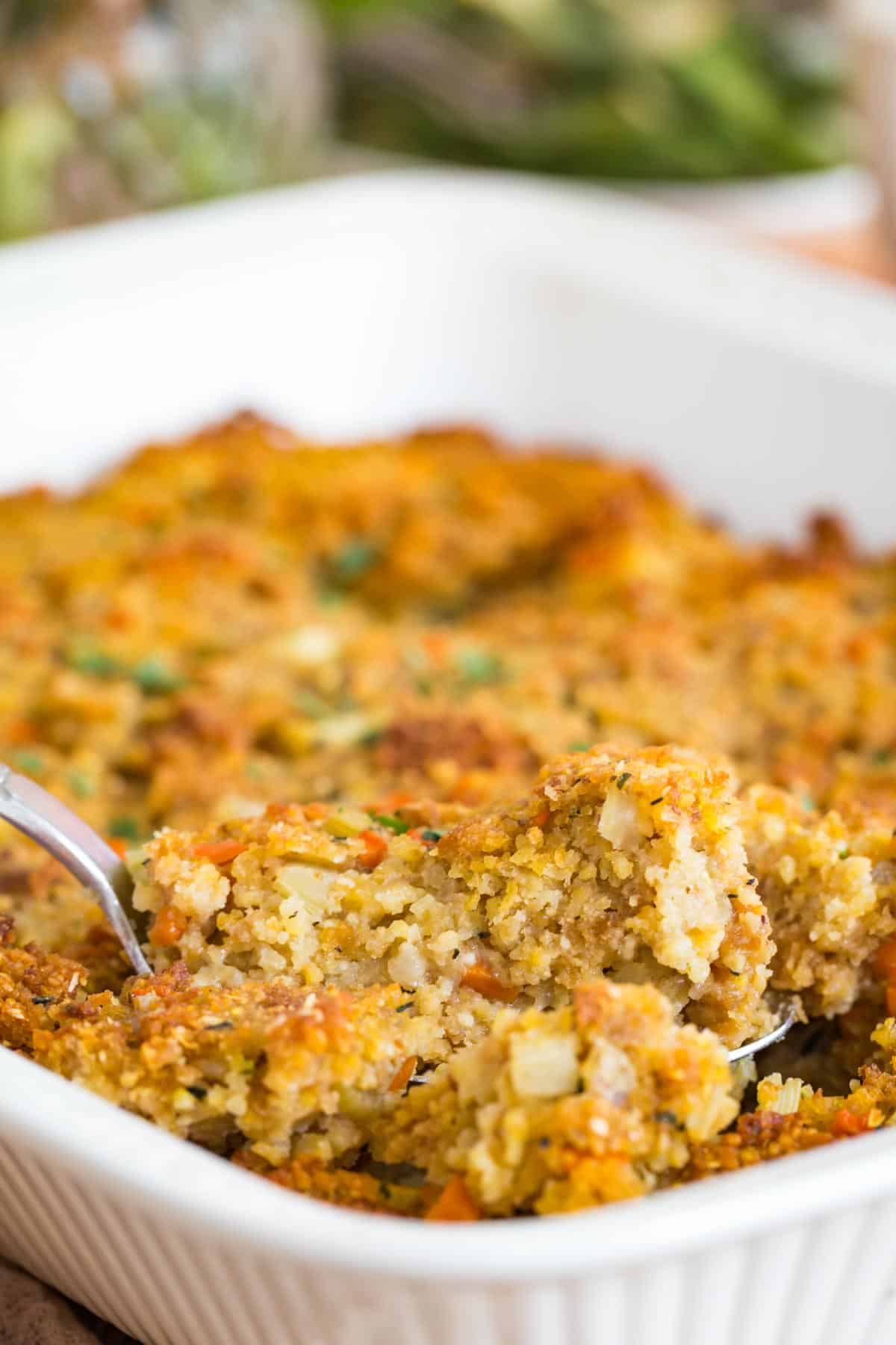 white baking dish of gluten free cornbread stuffing