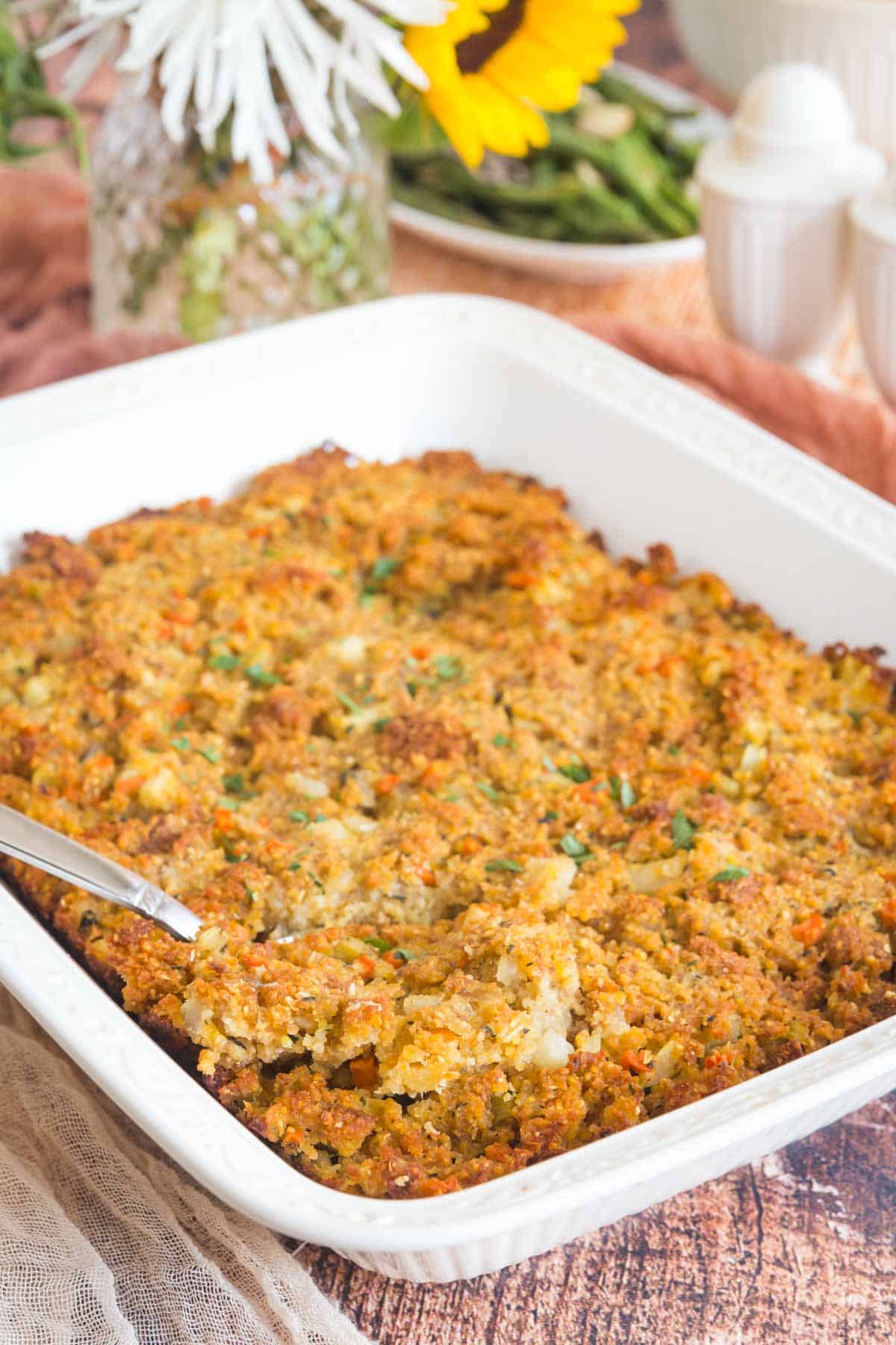 white baking dish of gluten free cornbread stuffing