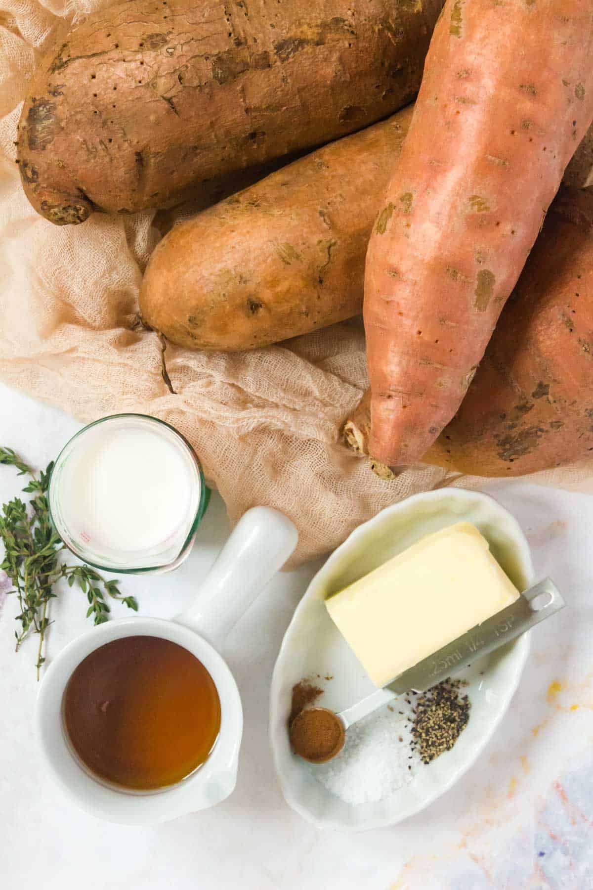 ingredients for mashed sweet potatoes with maple syrup and thyme