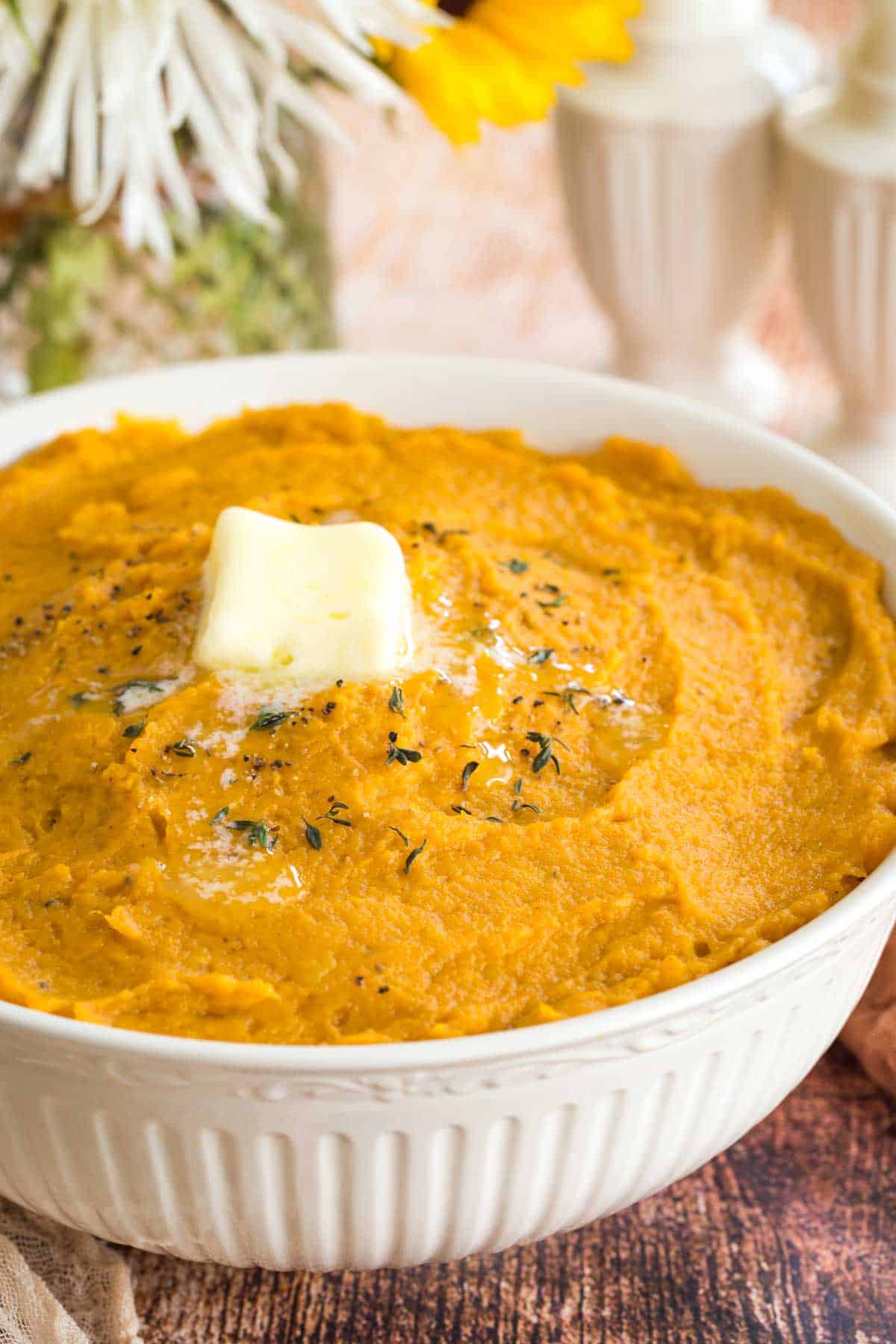 bowl of mashed sweet potatoes with butter