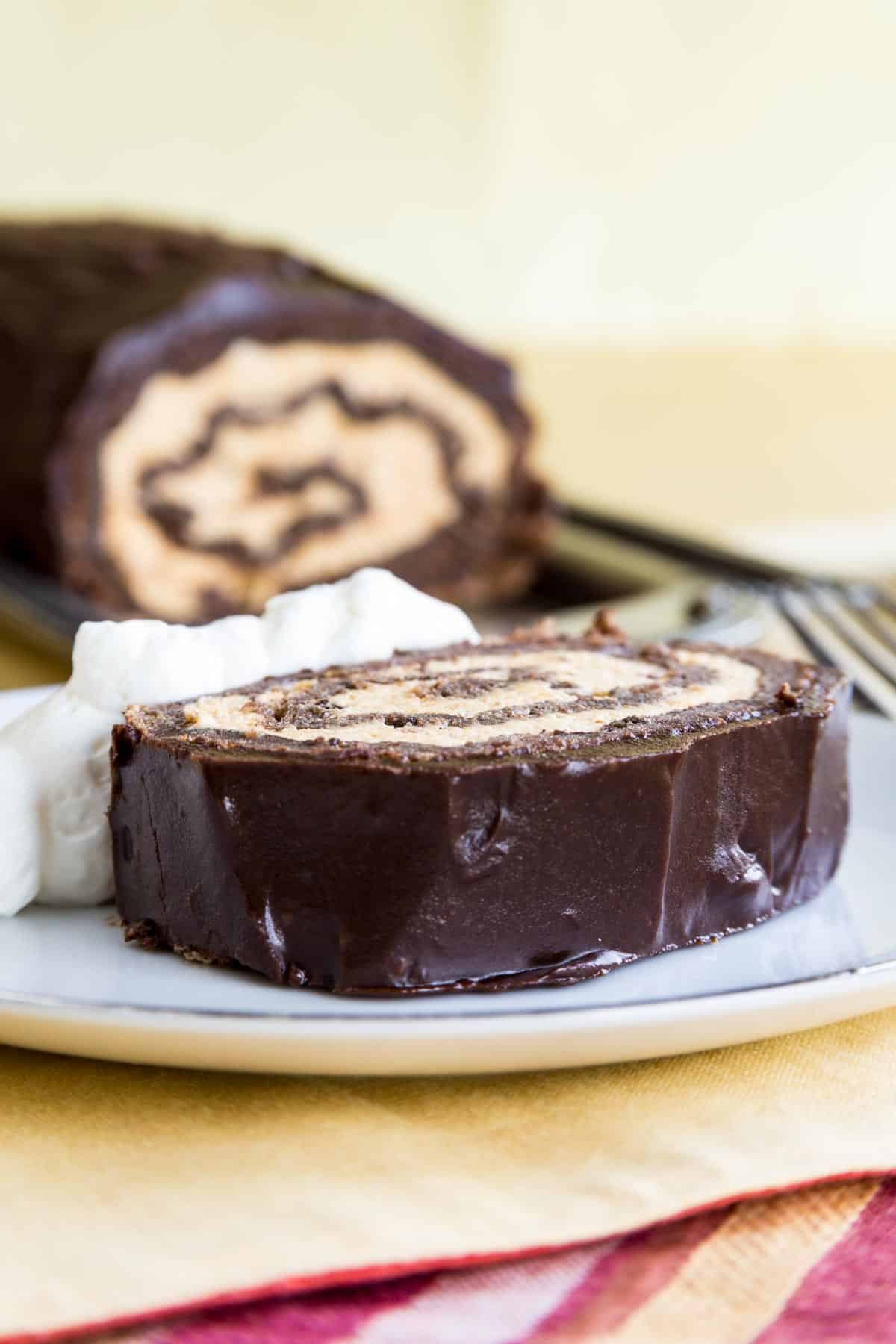 slice of chocolate cake roll with pumpkin filling