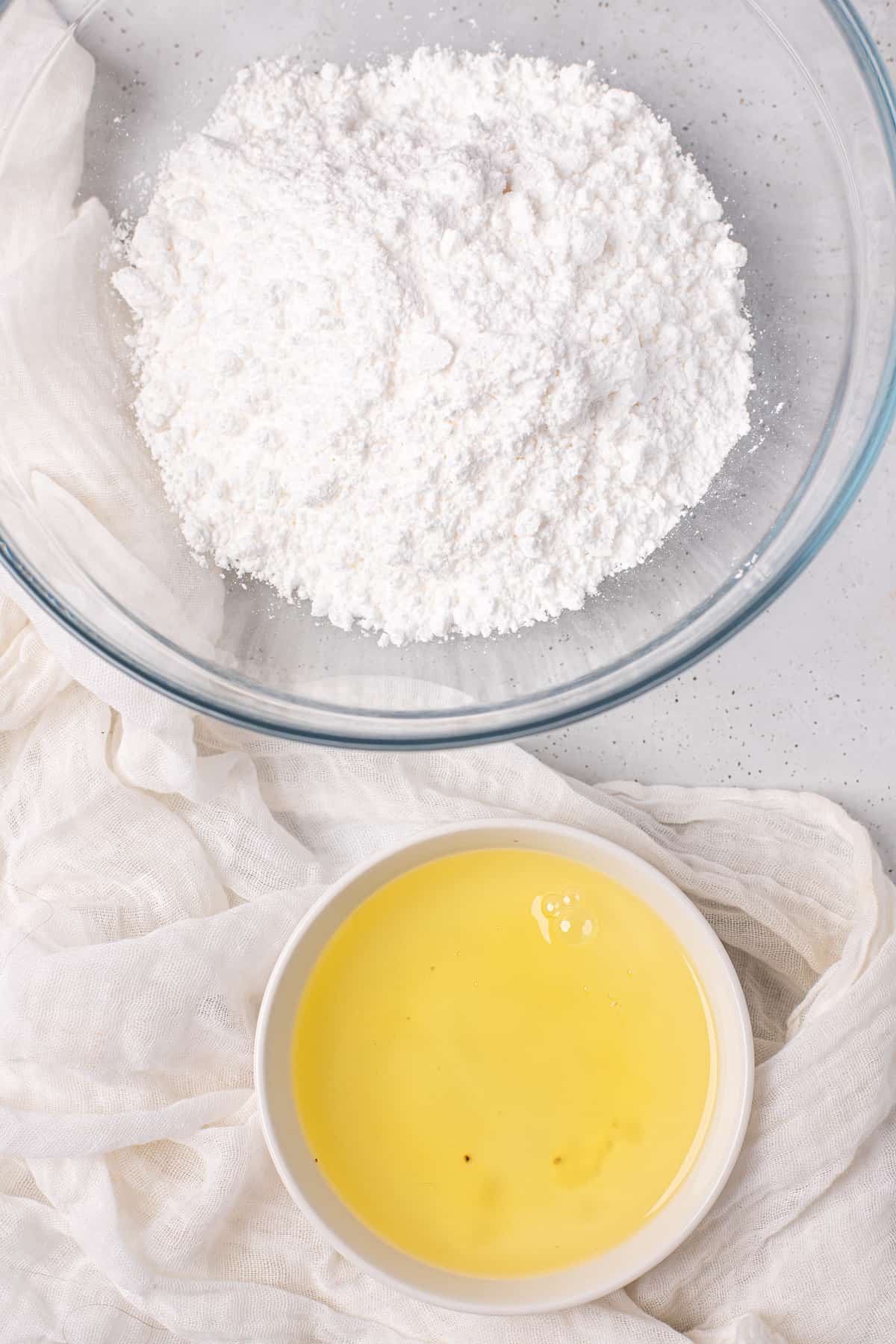 ingredients for royal icing: egg whites and powdered sugar