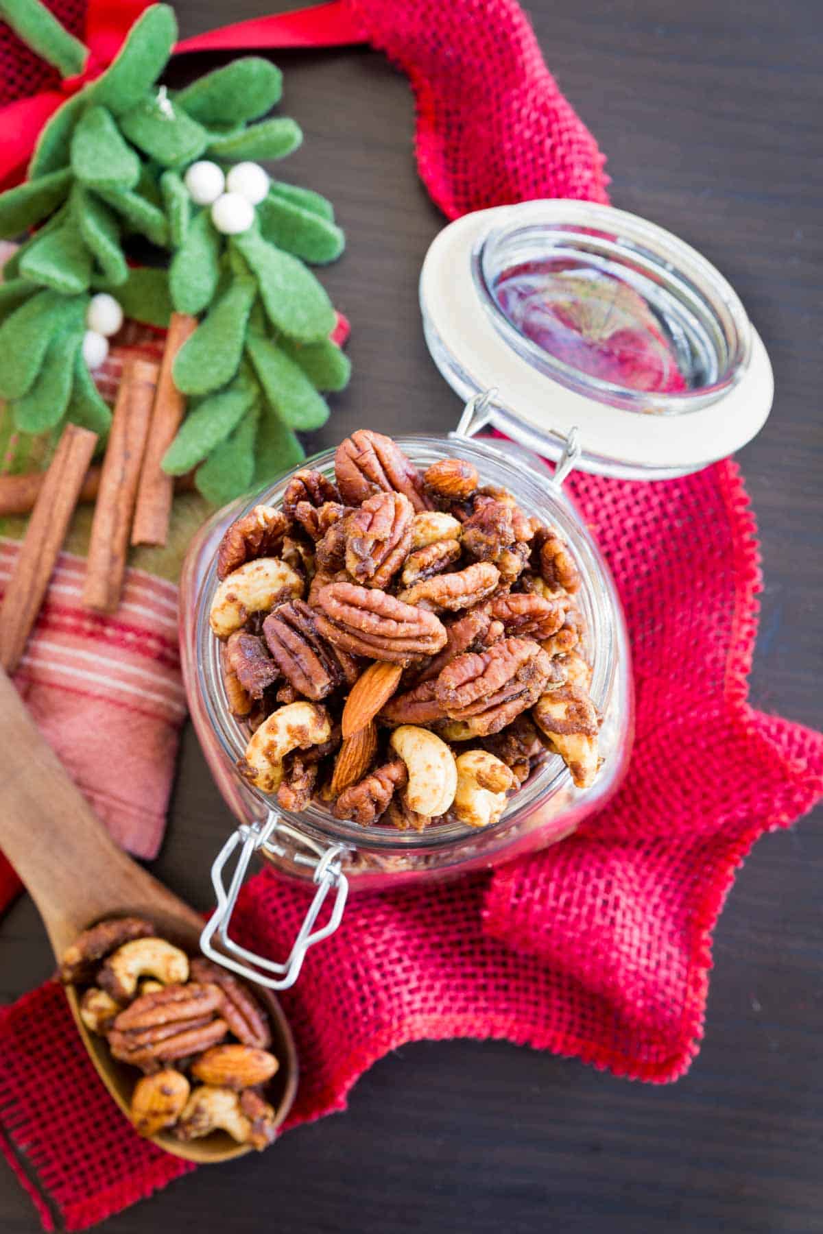 jar of spice nuts with holiday decorations