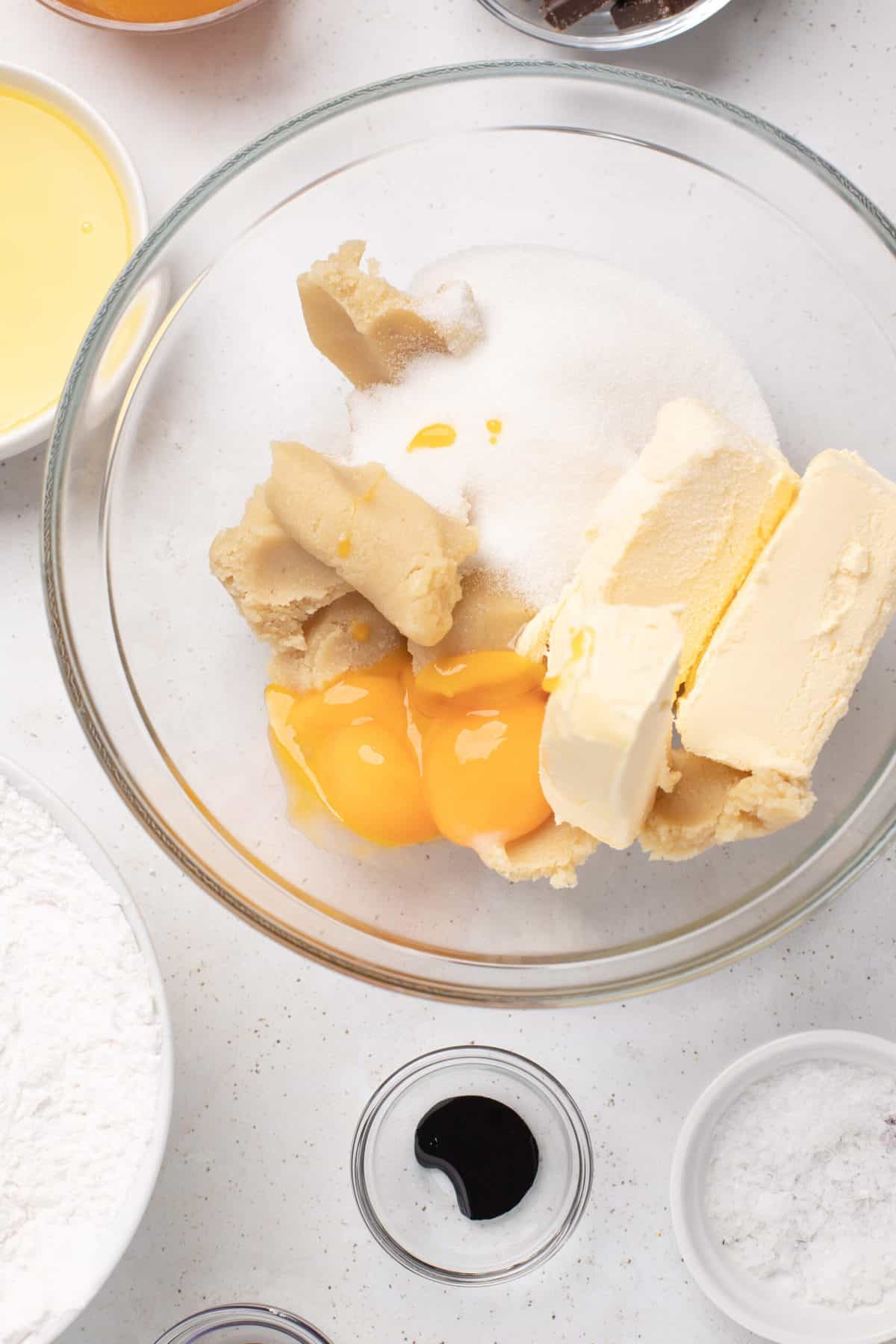 mixing bowl with sugar, marzipan and eggs