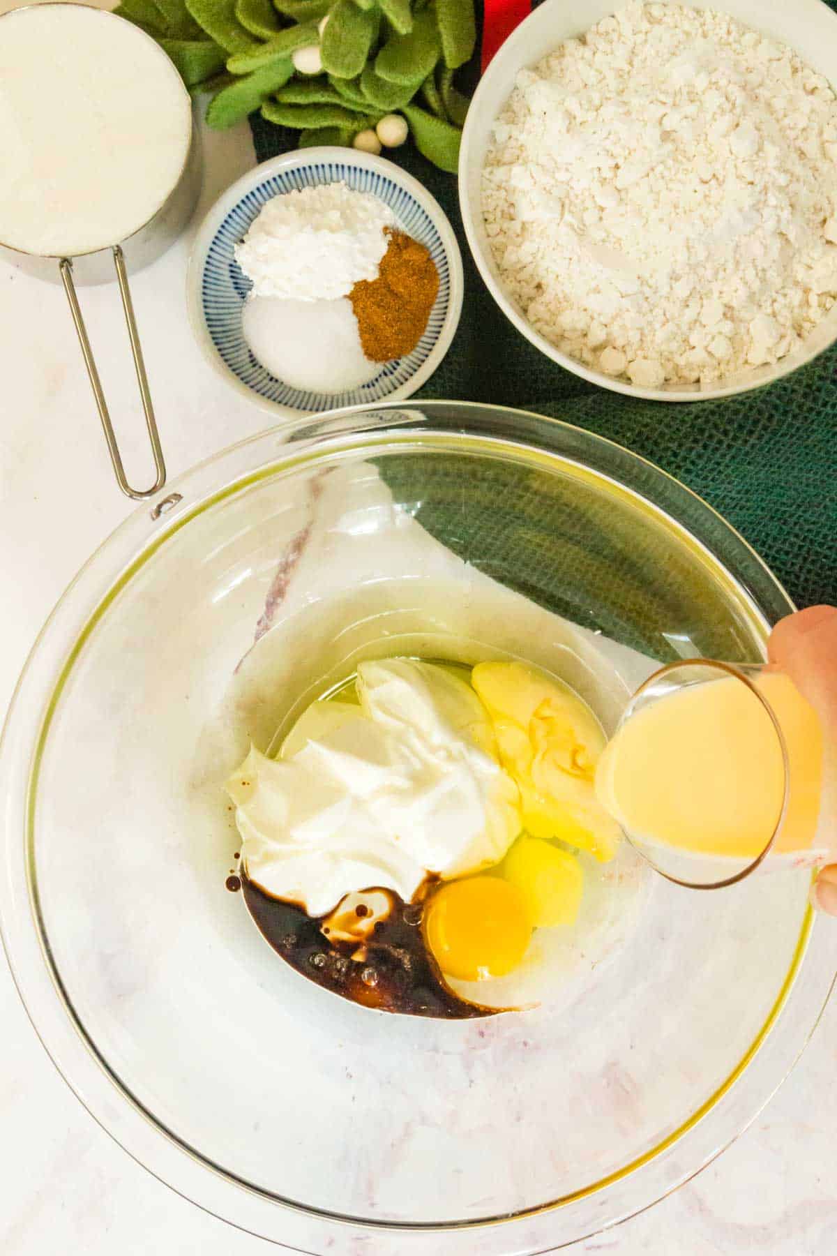 mixing bowl with eggs, yogurt and vanilla