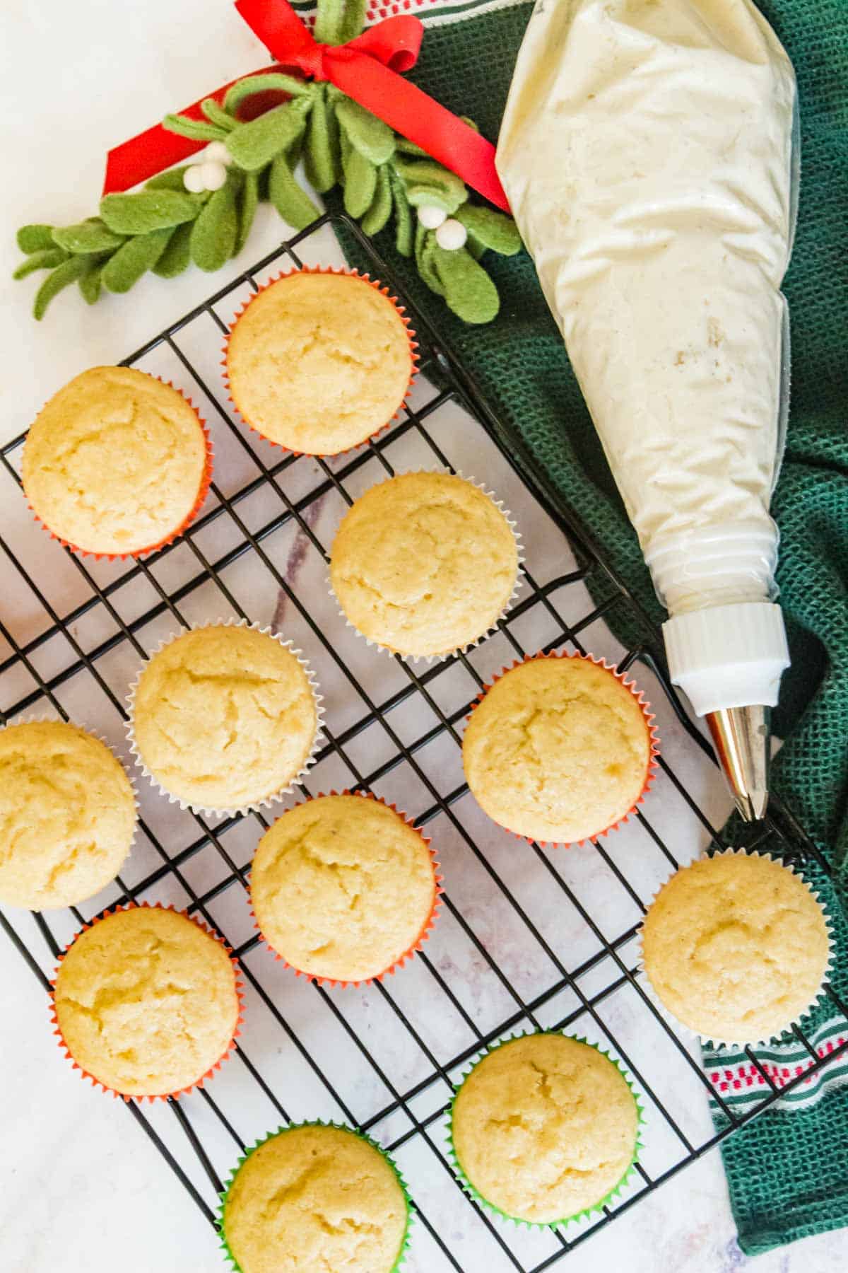eggnog cupcakes on a wire rack