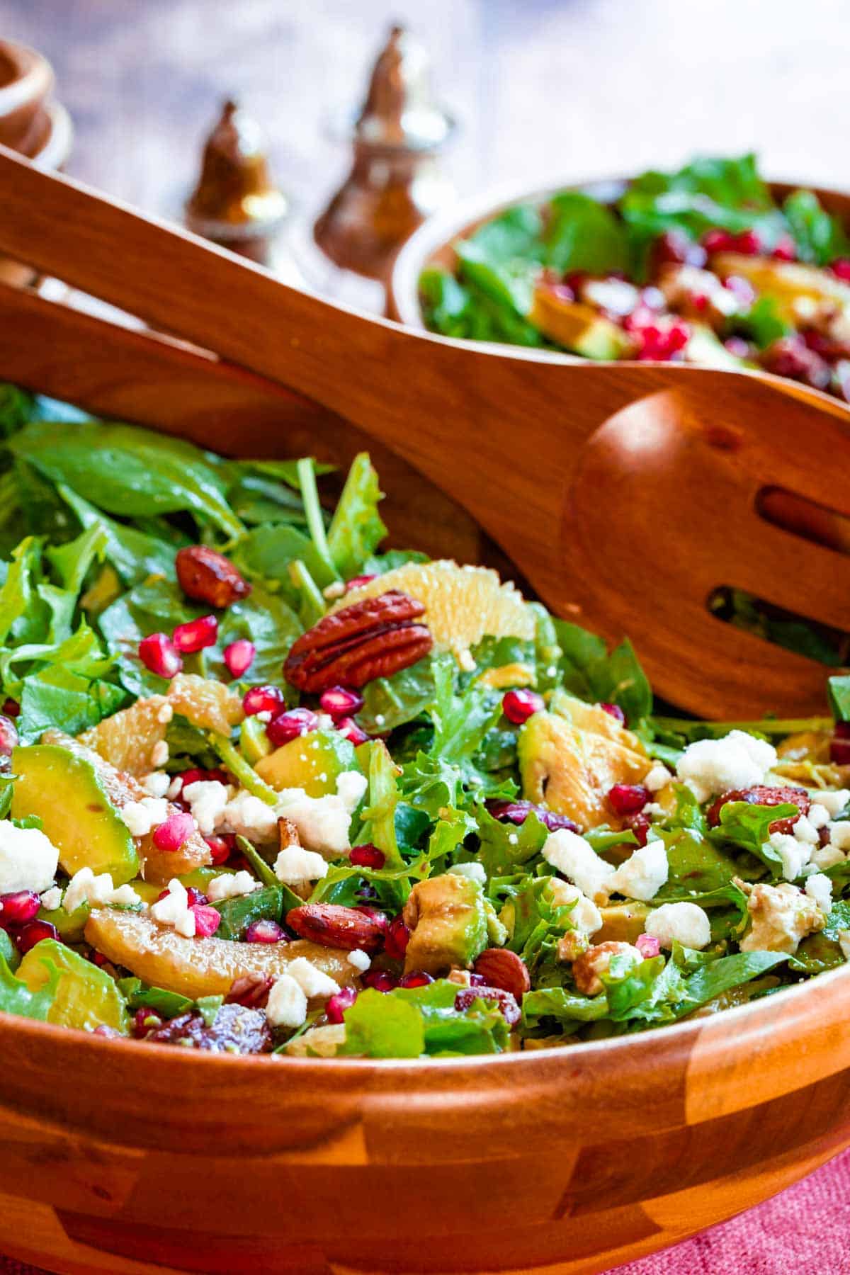 tossed salad with winter fruits and candied nuts