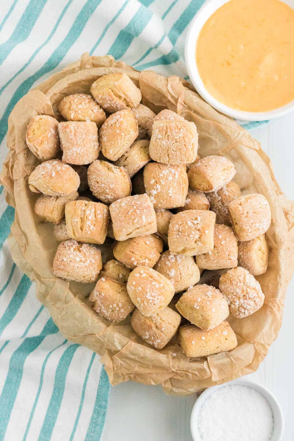 A tray full of gluten free pretzel nuggets.