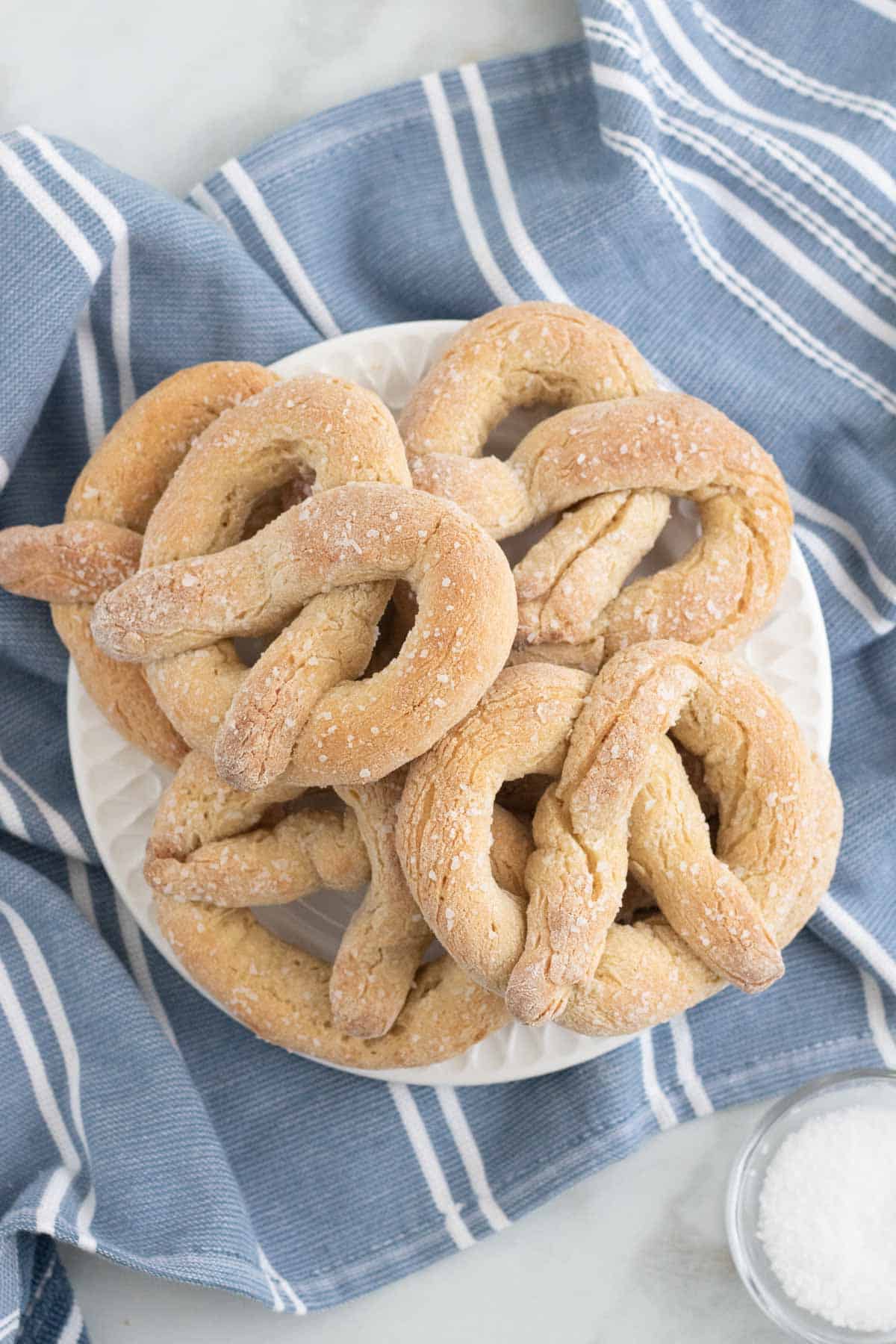 Gluten free soft pretzels on a plate.