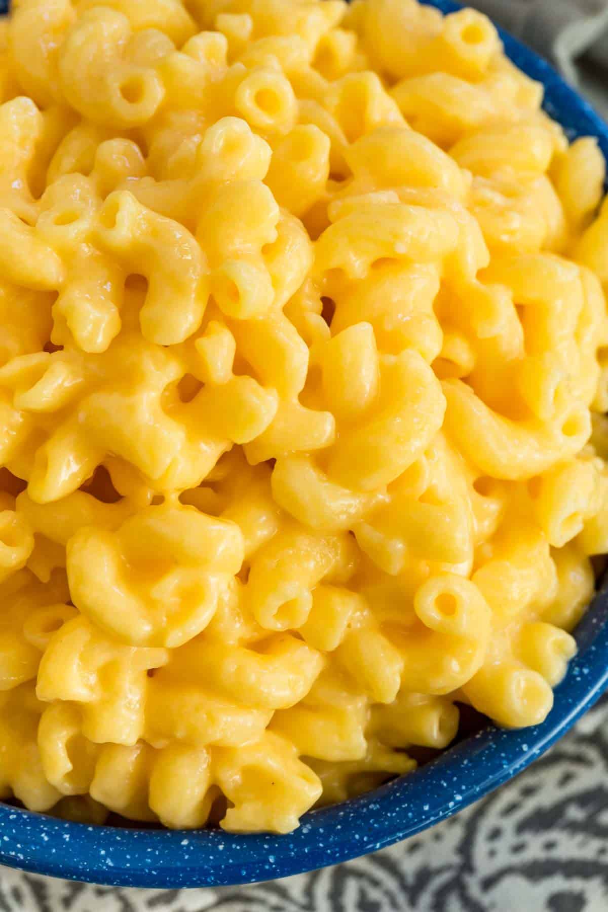 Close up of stovetop mac and cheese noodles in a bowl.