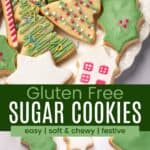 gluten free Christmas sugar cookies displayed on a platter and scattered on a table