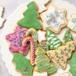 gluten free sugar cookies decorated for Christmas with royal icing and displayed on a platter