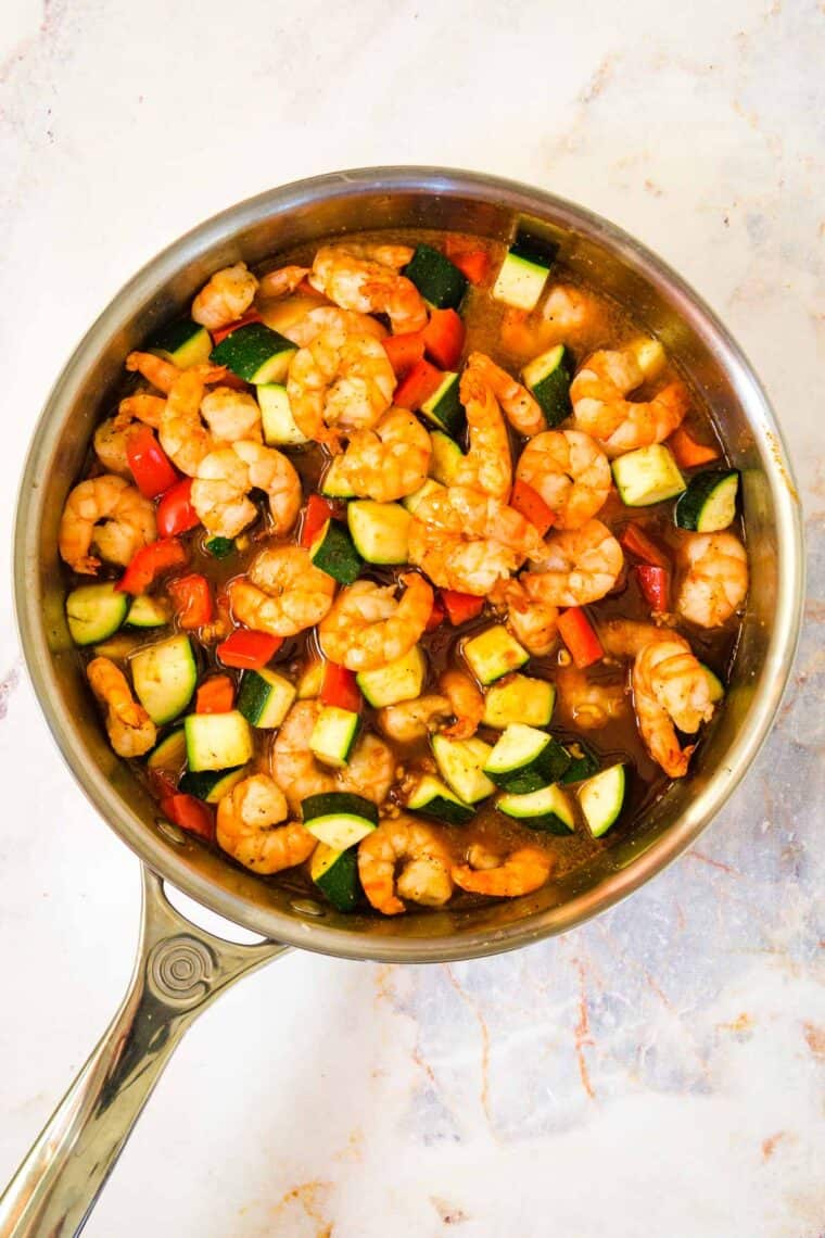 shrimp with bourbon sauce in a skillet