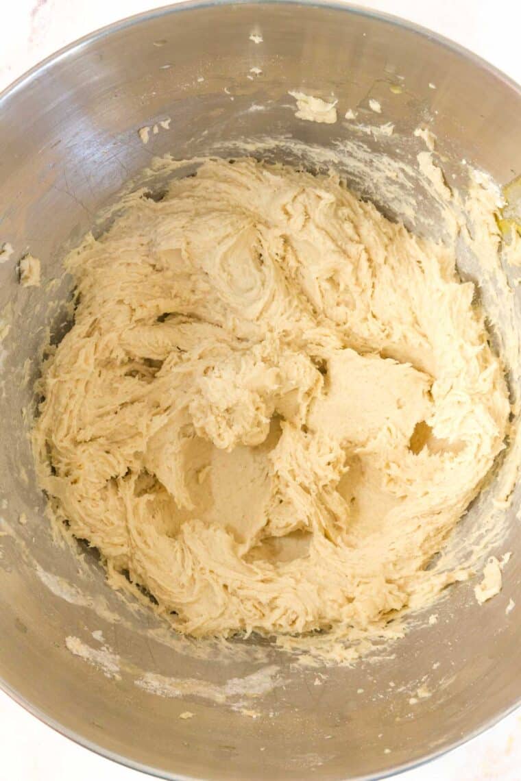 Breadstick dough comes together in the bowl of a stand mixer.