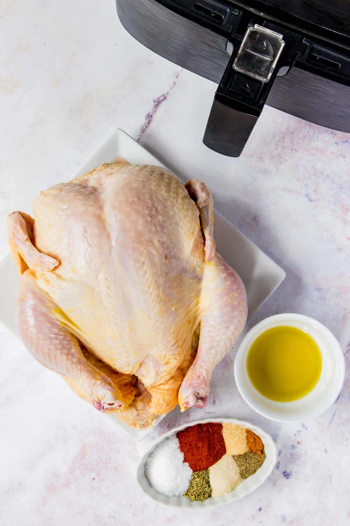 The ingredients for air fryer rotisserie chicken.