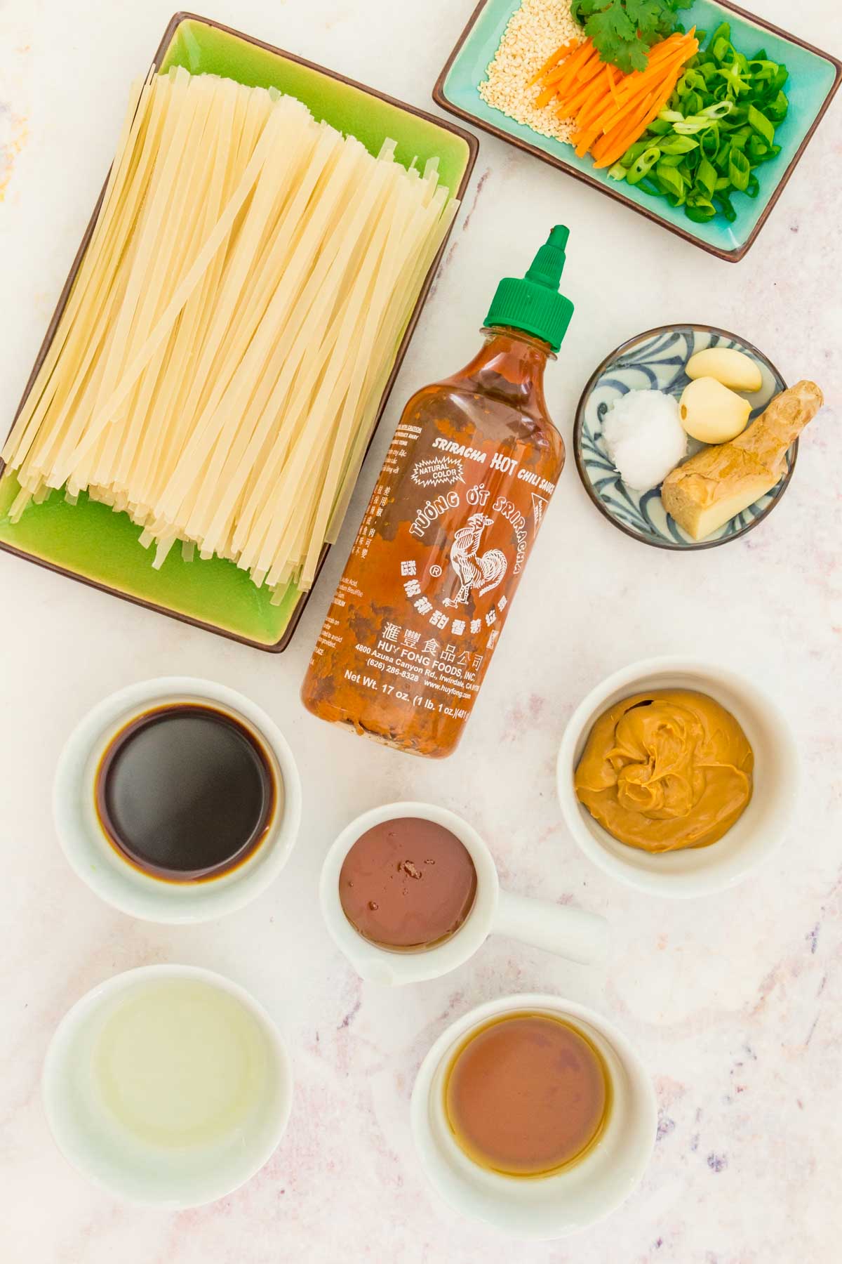 All of the ingredients for Spicy Sesame Noodles laid out on the counter.