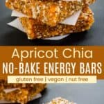 Three stacked apricot chia energy bars and one on a square of wax paper.