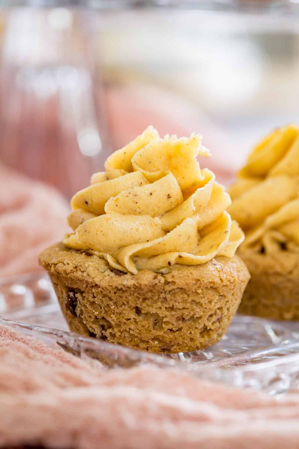 A Pumpkin Frosted Cookie Cup from up close so the spices can be seen in the buttercream.