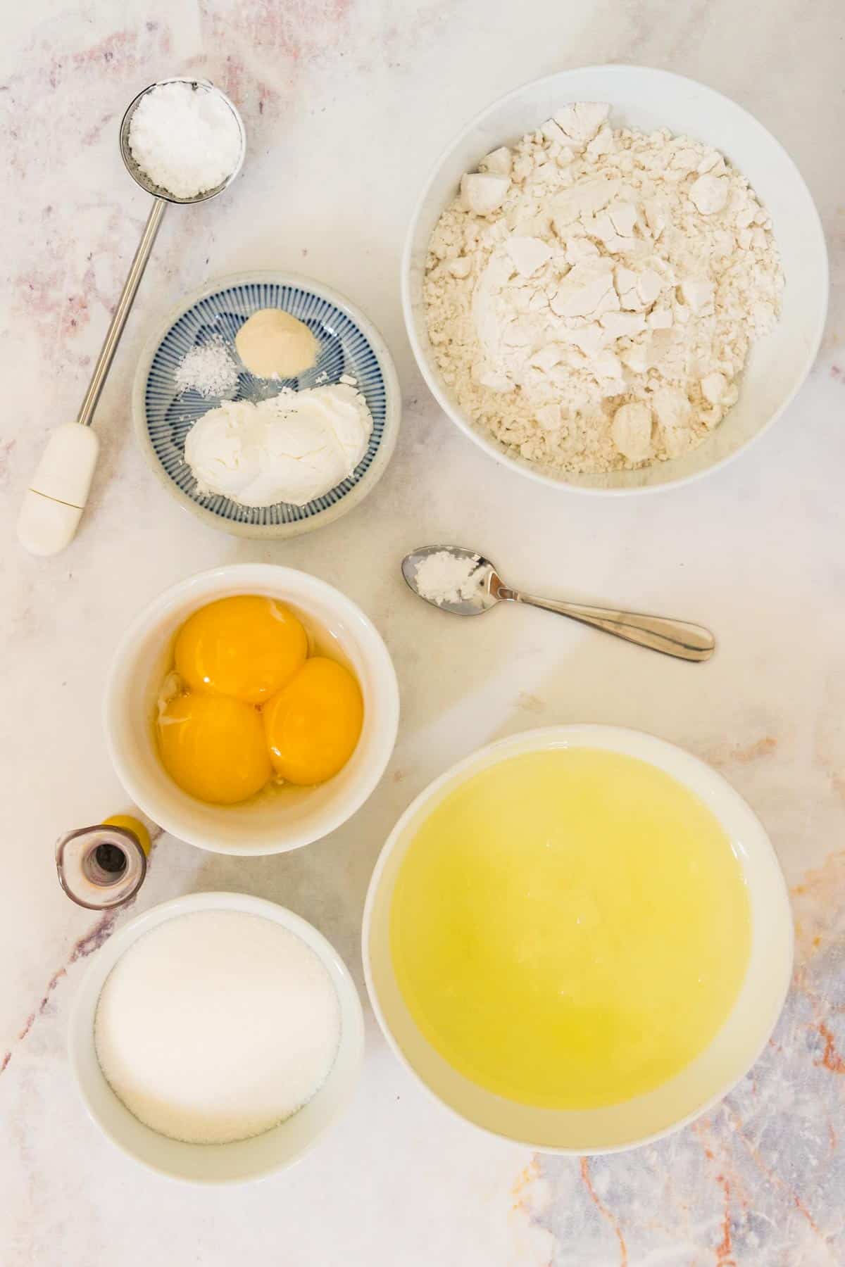 The ingredients for homemade gluten free ladyfingers.