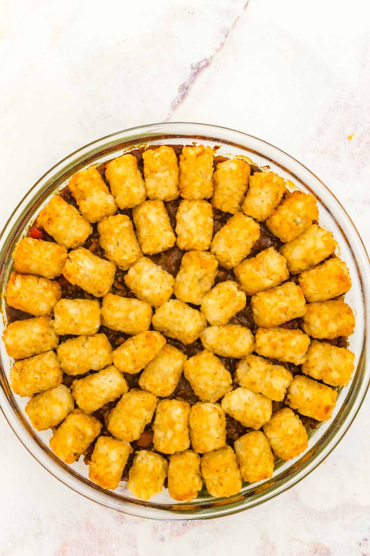 Top view of sloppy joe tater tot casserole after baking in the oven.