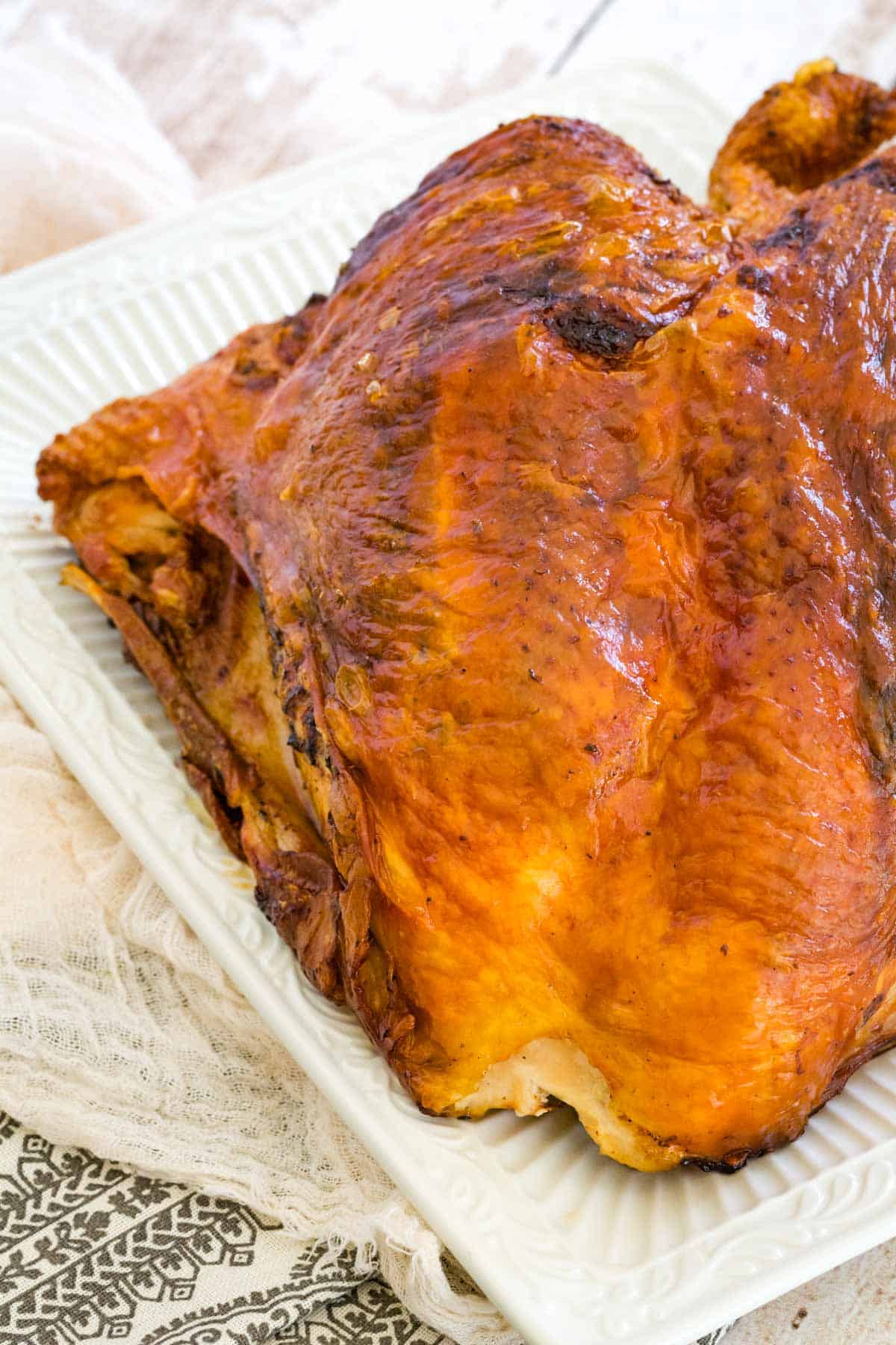 Roasted air fryer turkey breast on a platter.