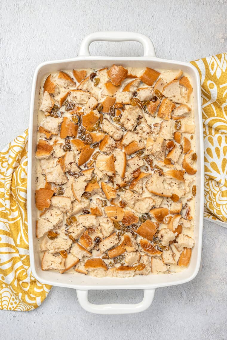 Assembled bread pudding in a large rectangular baking dish.
