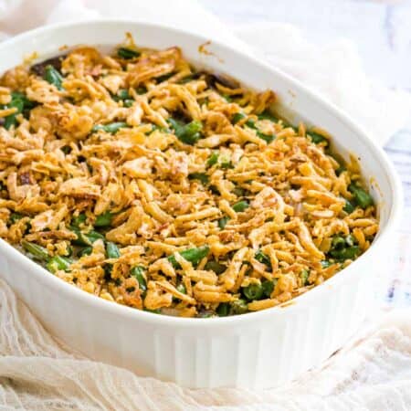 Gluten-free green bean casserole in a large white baking dish.